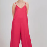Bright pink jumpsuit sewn using the I AM Valérie sewing pattern