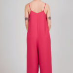 Bright pink jumpsuit sewn using the I AM Valérie sewing pattern