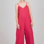Bright pink jumpsuit sewn using the I AM Valérie sewing pattern