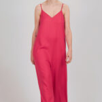 Bright pink jumpsuit sewn using the I AM Valérie sewing pattern